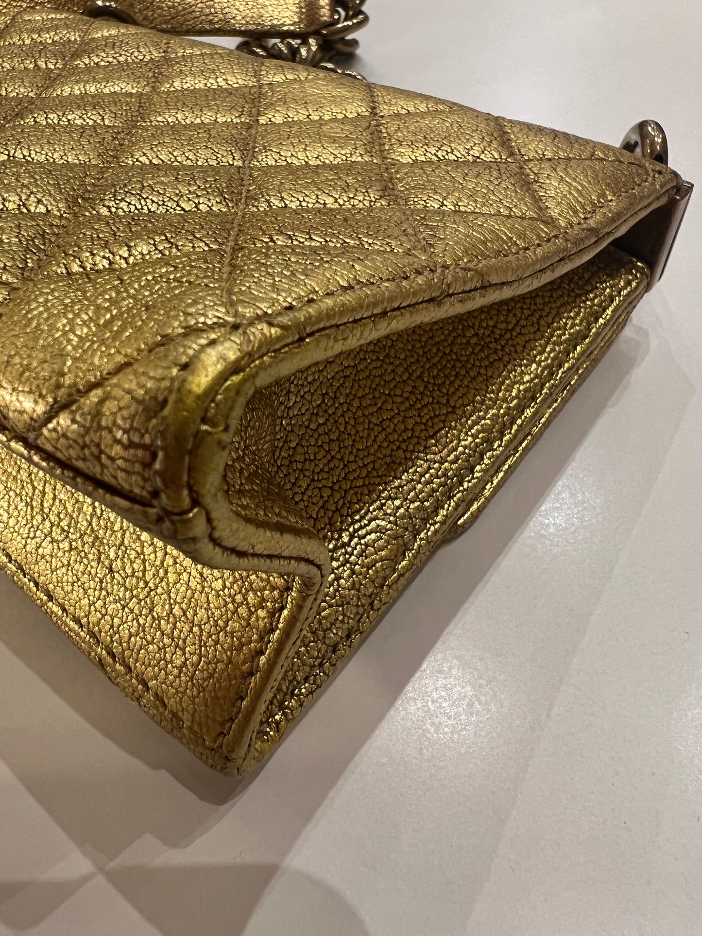 Chanel Rita single flap gold bag