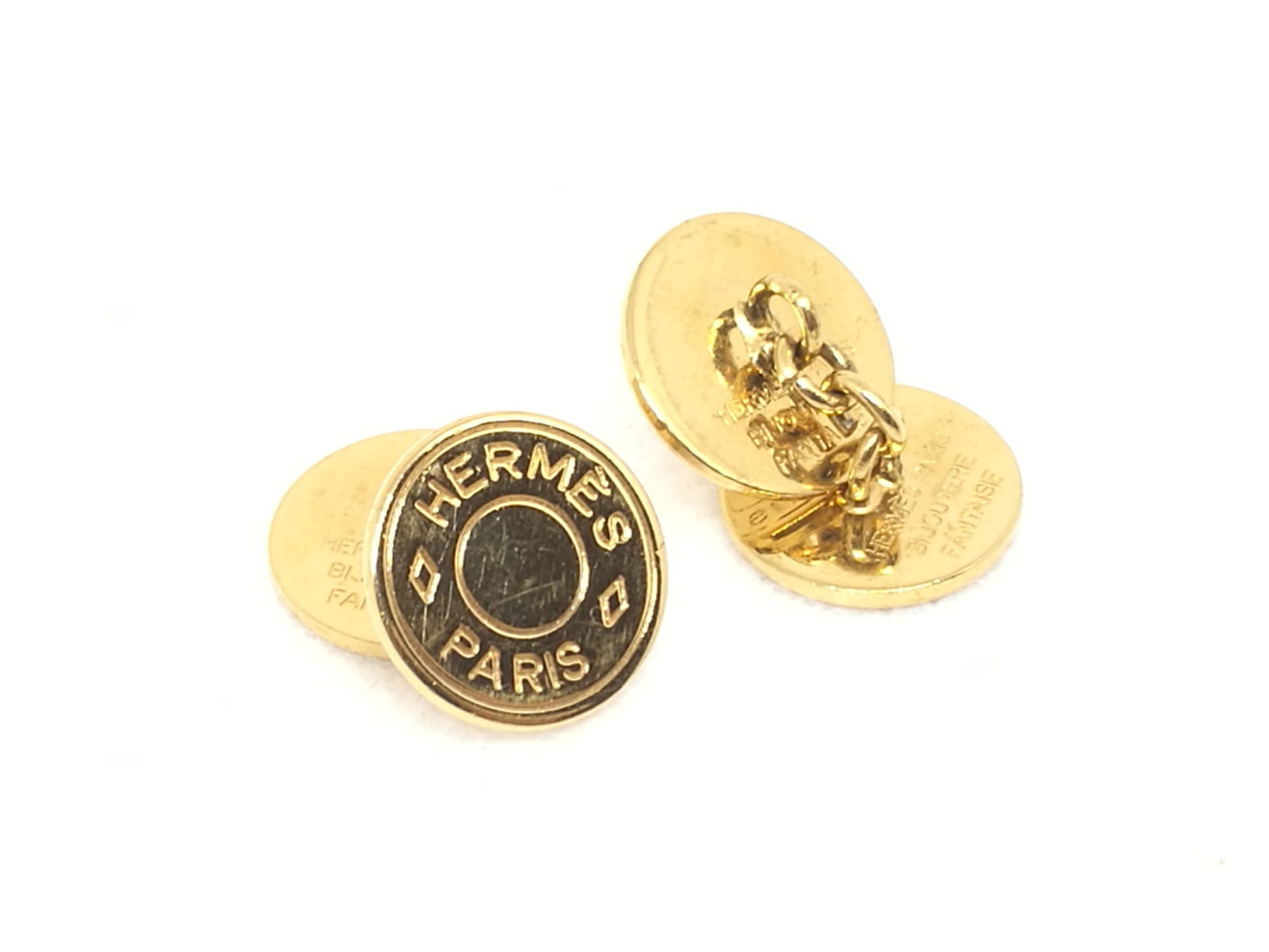 Gemelli uomo Hermès dorati