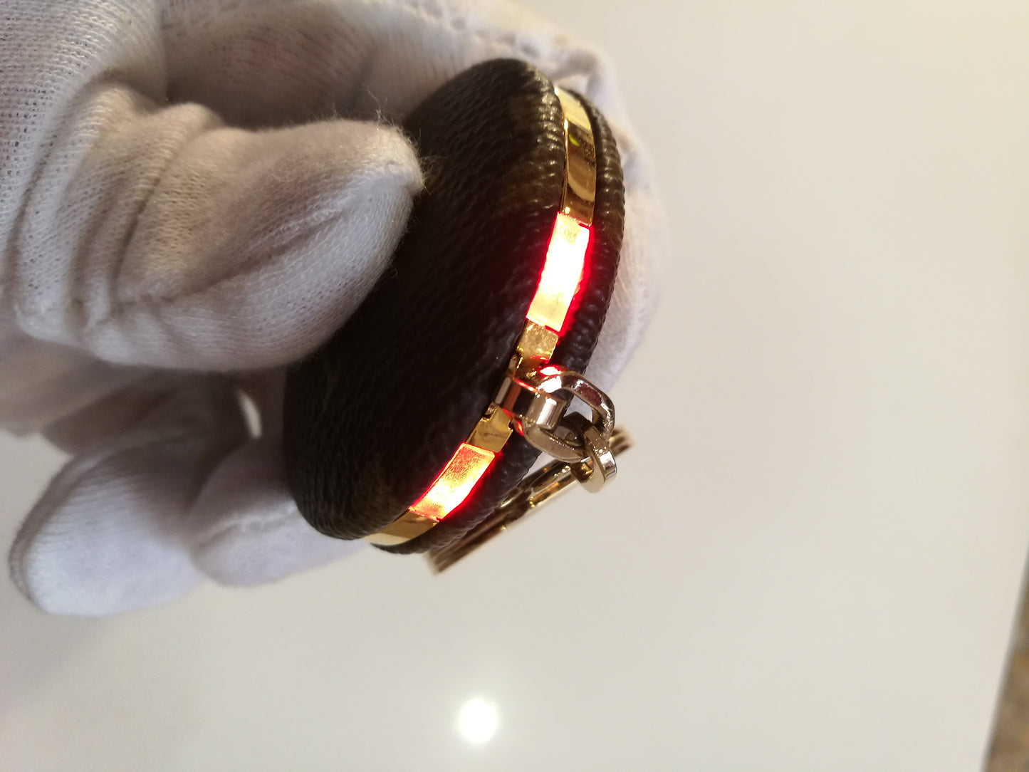 Preloved Louis Vuitton key ring Astropill flash light & bag charm