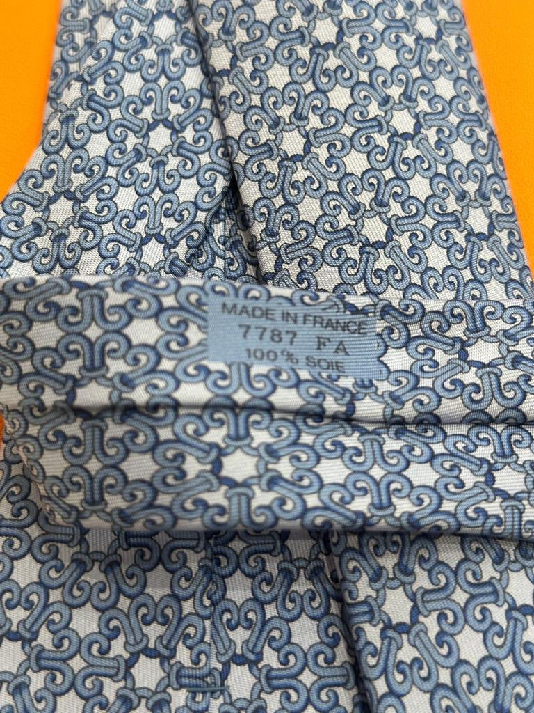 Cravatta vintage Hermès geometrica base blu 7787FA
