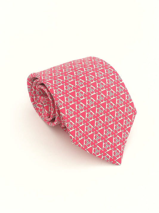 Cravatta Hermès con sfondo rosa con fantasia triangoli con cerchi bianchi