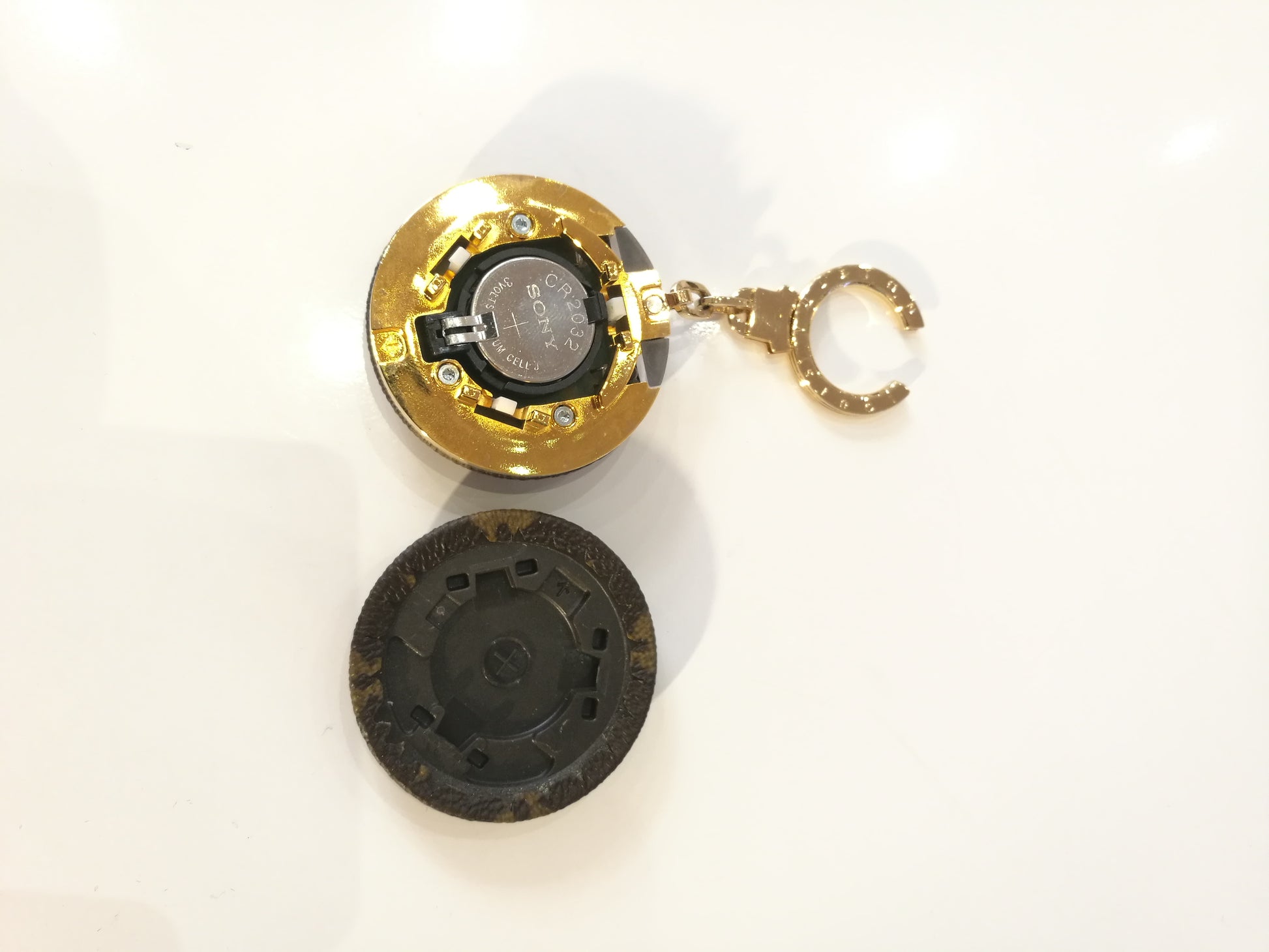 Preloved Louis Vuitton key ring Astropill flash light & bag charm – icons  luxury vintage