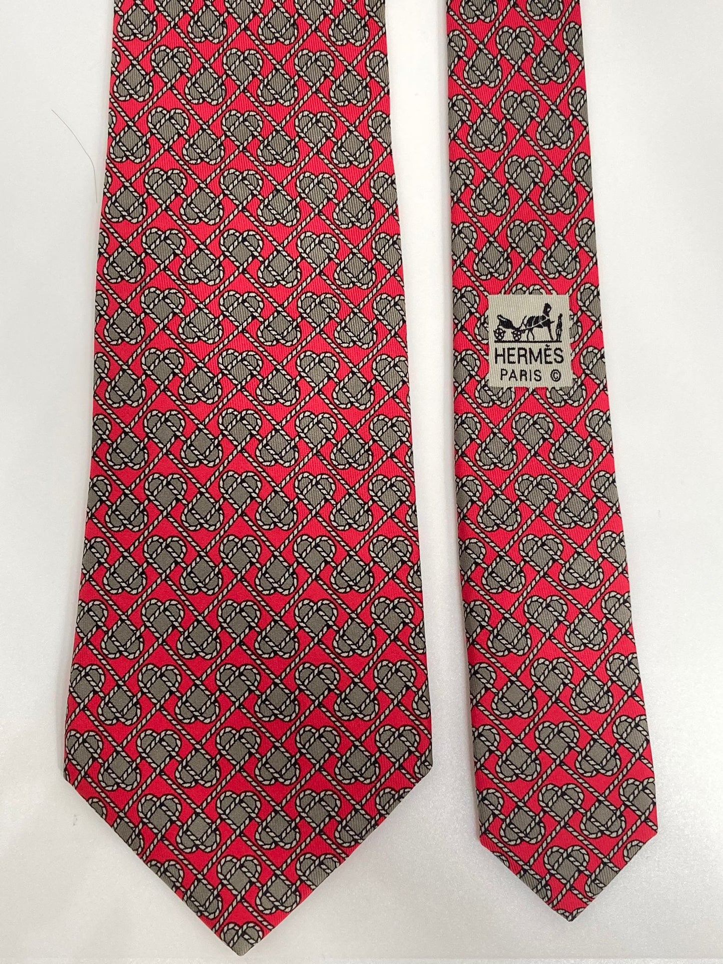 Cravatta Hermès con cuori intrecciati c.7308EA