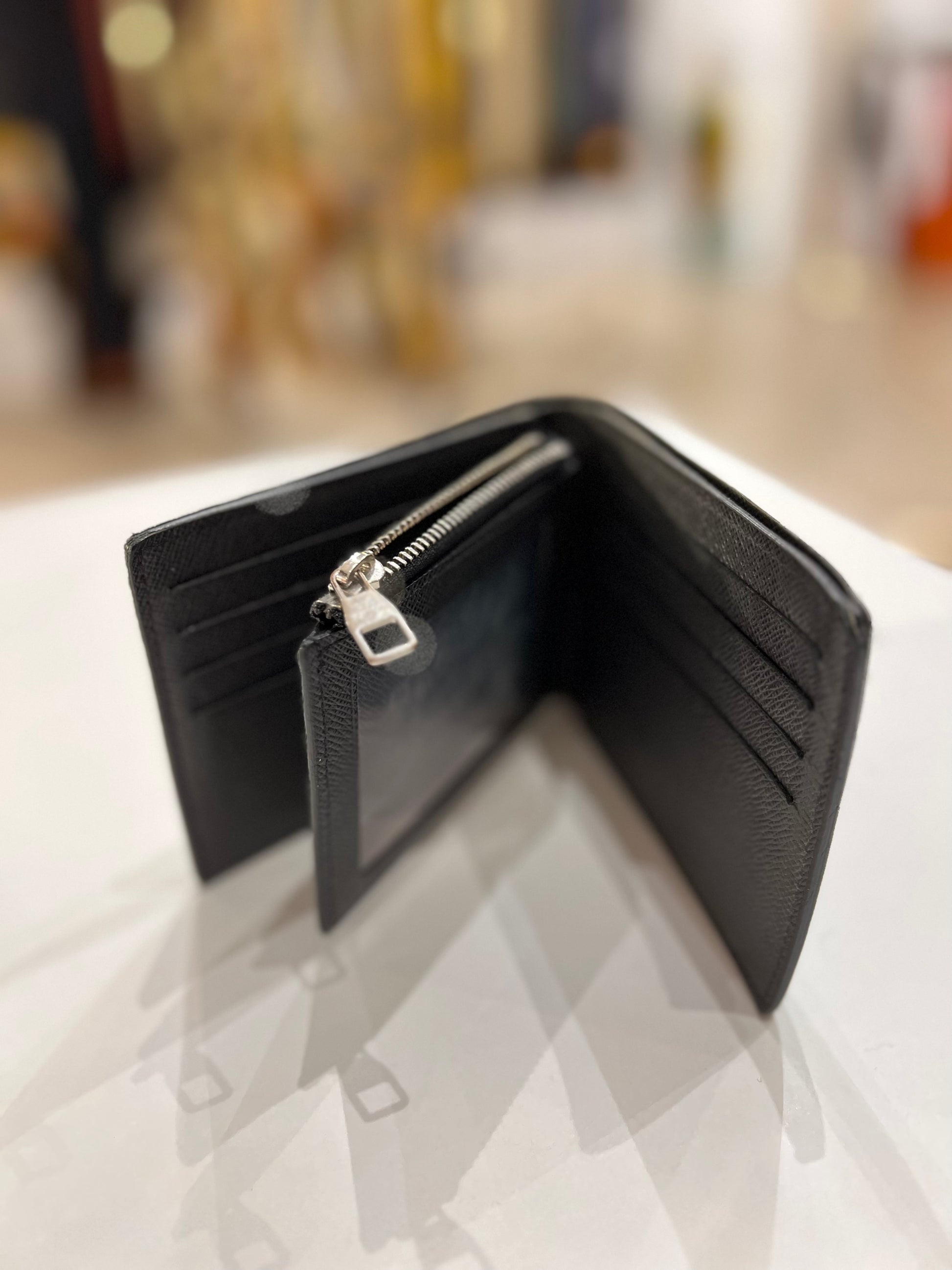 Louis Vuitton Amerigo wallet – icons luxury vintage